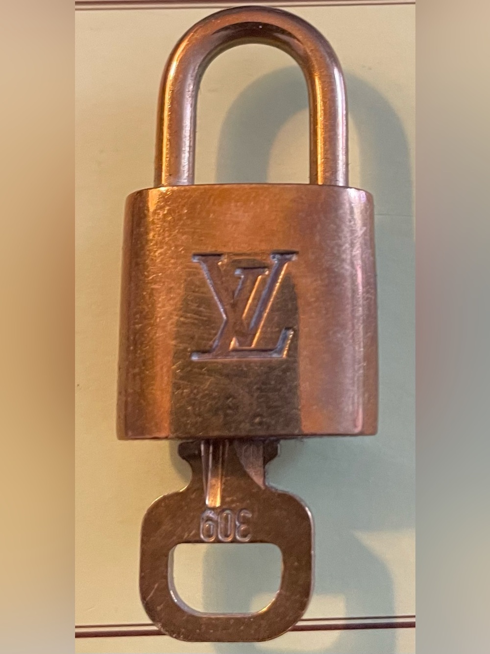 Louis Vuitton Copper-Tone Padlock with LV Monogram